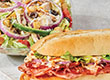 LUNCH ANY HALF HOUSE BAKED SUB & GARDEN DELLA CASA SIDE SALAD image